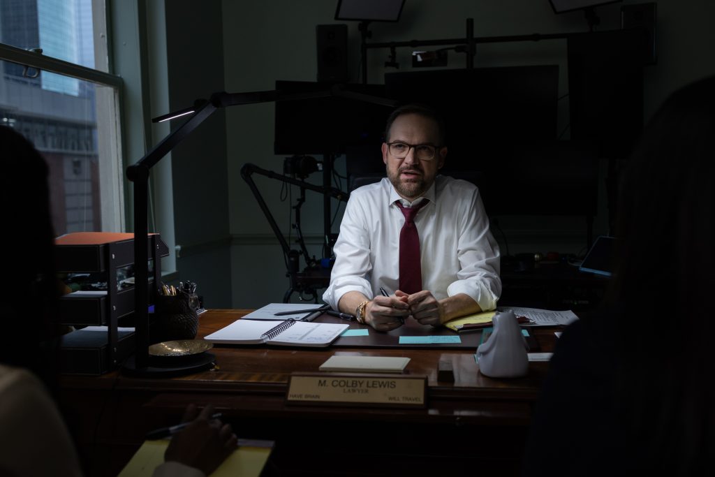 Top 100 Houston personal injury lawyer Colby Lewis in his Esperson Building office reviewing the March 1, 2026, Texas Rule 166a summary judgment overhaul.