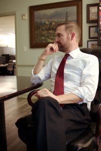 Texas wrongful death attorney consulting compassionately with a grieving family